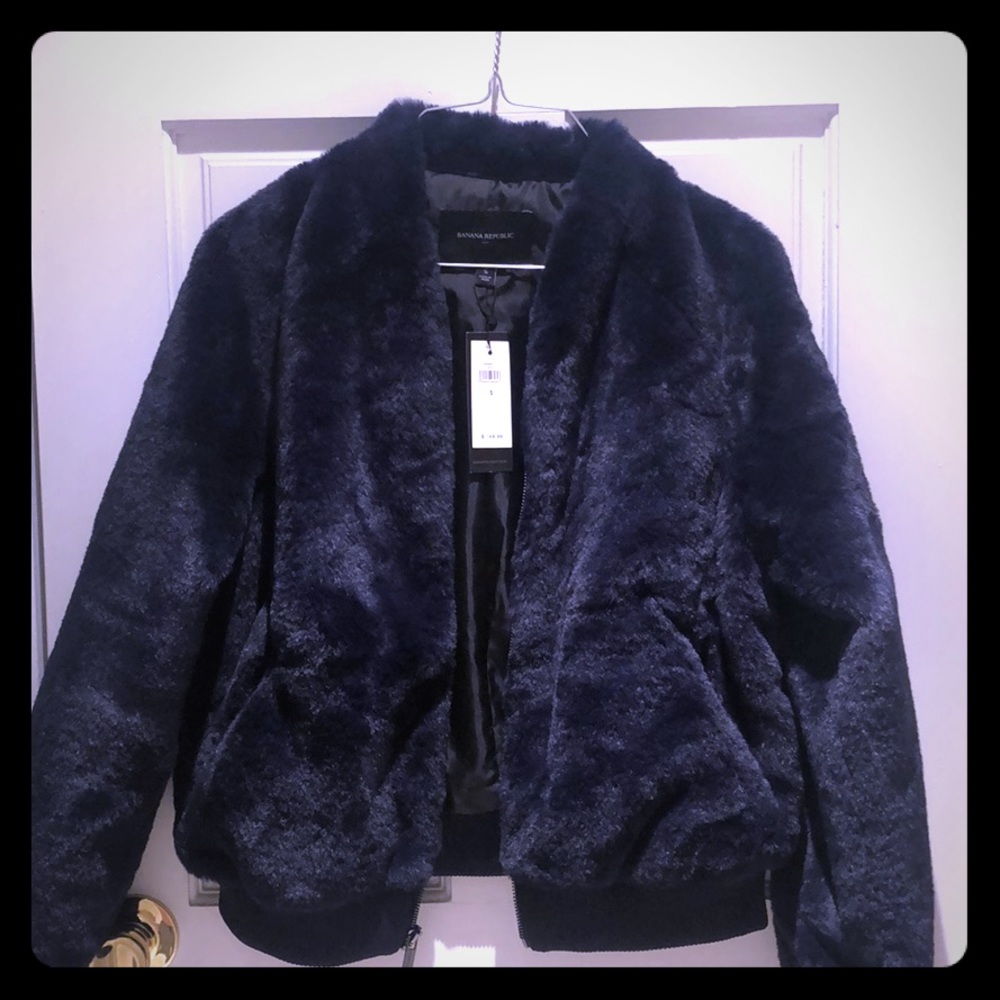 Never before worn faux fur navy blue jacket